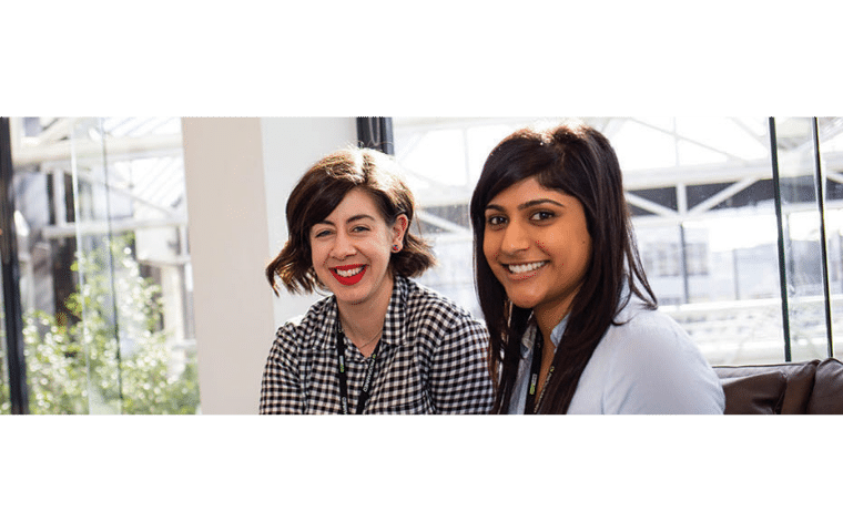 A photo of two women smiling